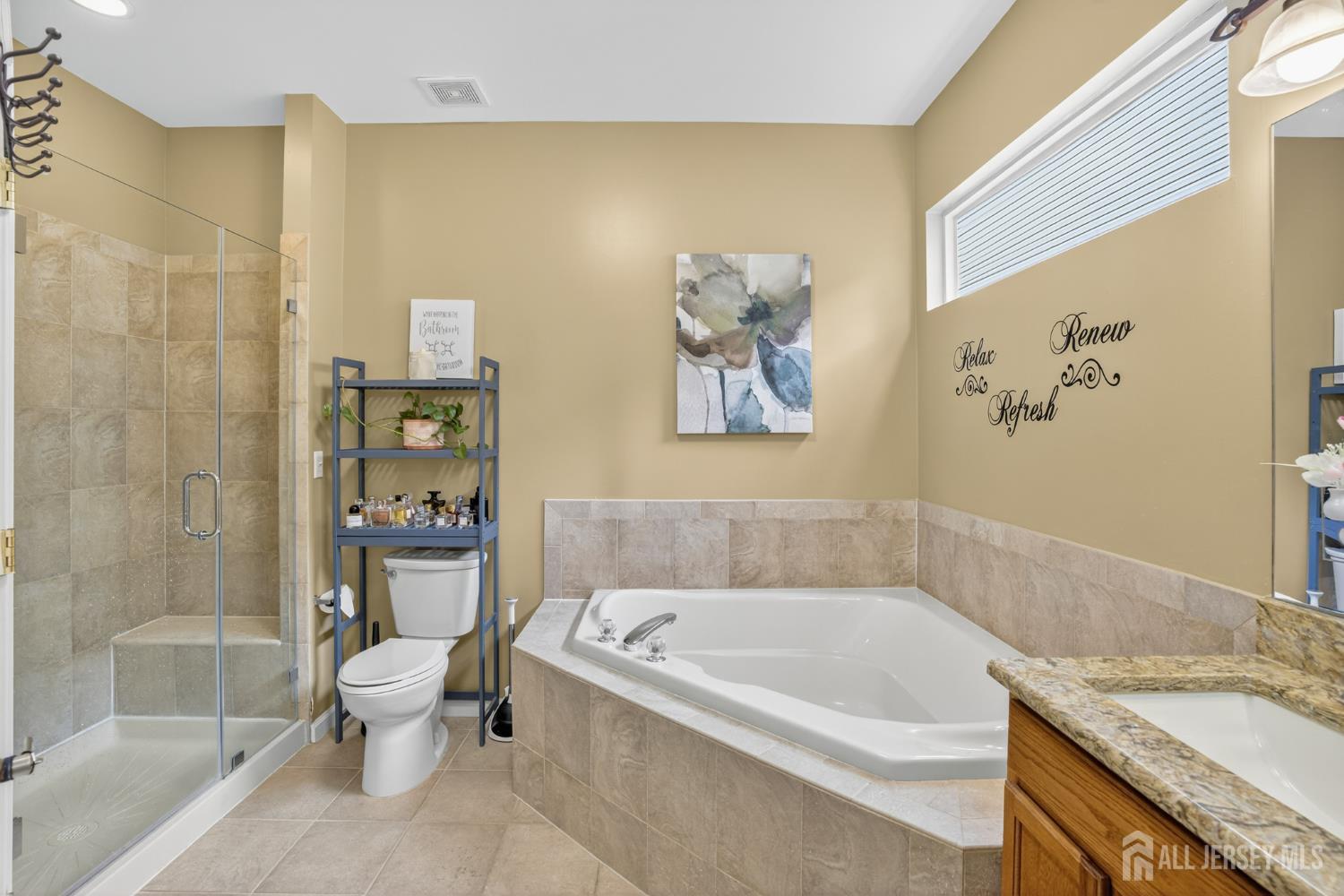 6 George Russell Way Clifton, NJ 07013 - Photo 28 of 45 a bathroom with a granite countertop bathtub sink and toilet