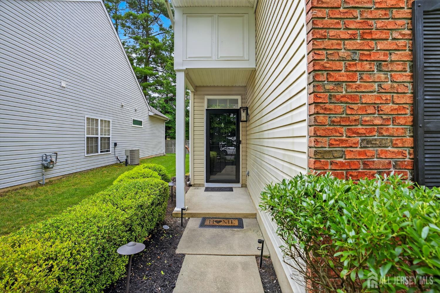 6 George Russell Way Clifton, NJ 07013 - Photo 41 of 45 a view of a pathway besides a house