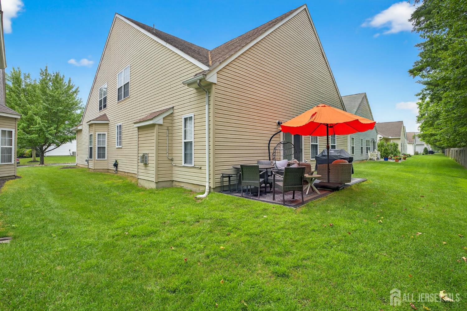 6 George Russell Way Clifton, NJ 07013 - Photo 43 of 45 a view of a house with a yard and sitting area