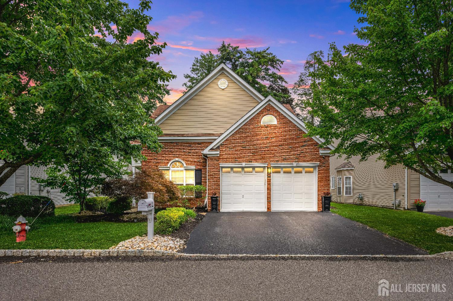 6 George Russell Way Clifton, NJ 07013 - Photo 45 of 45 a view of a house with a yard and garage