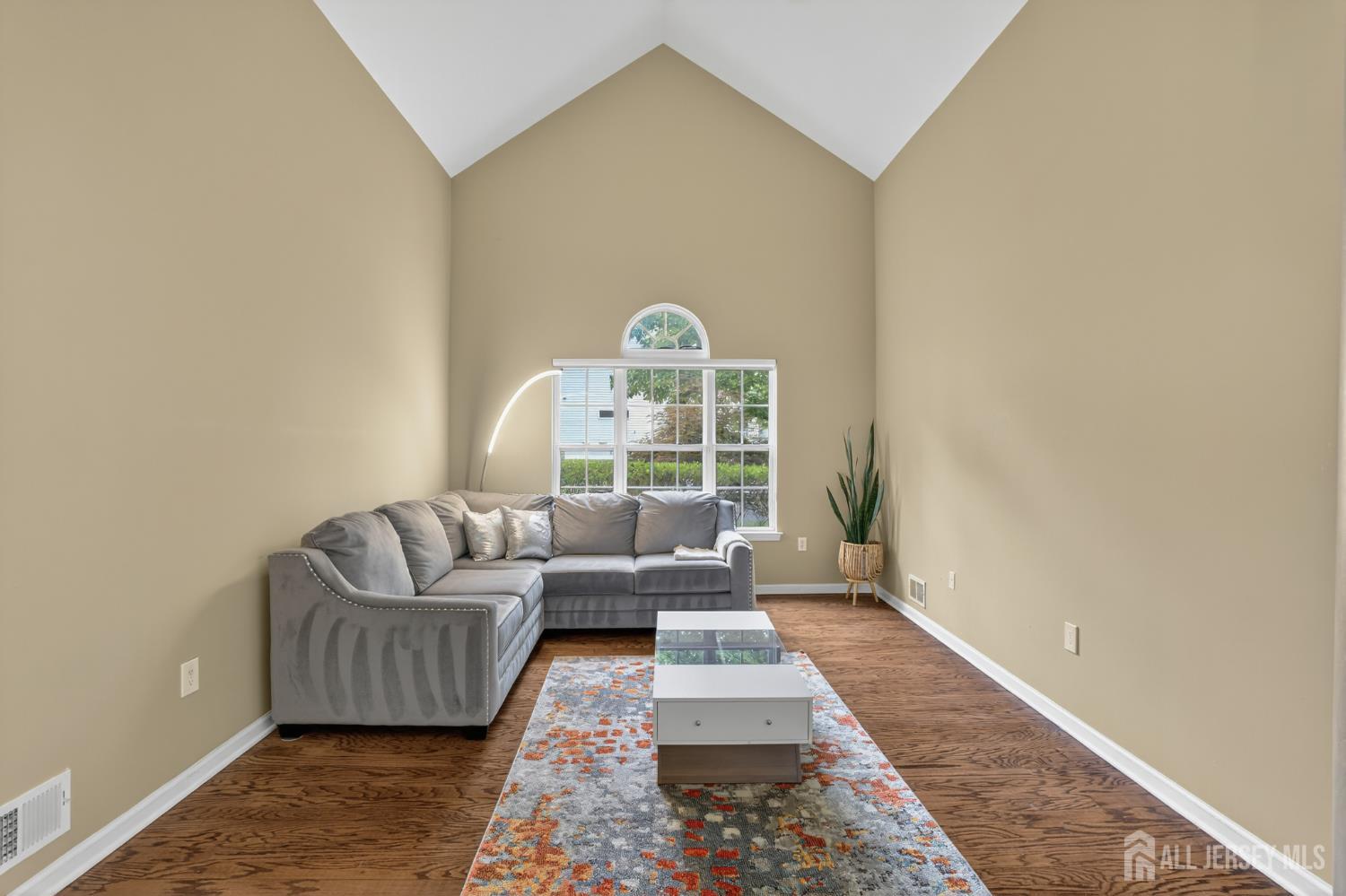 6 George Russell Way Clifton, NJ 07013 - Photo 5 of 45 a living room with furniture and a large window