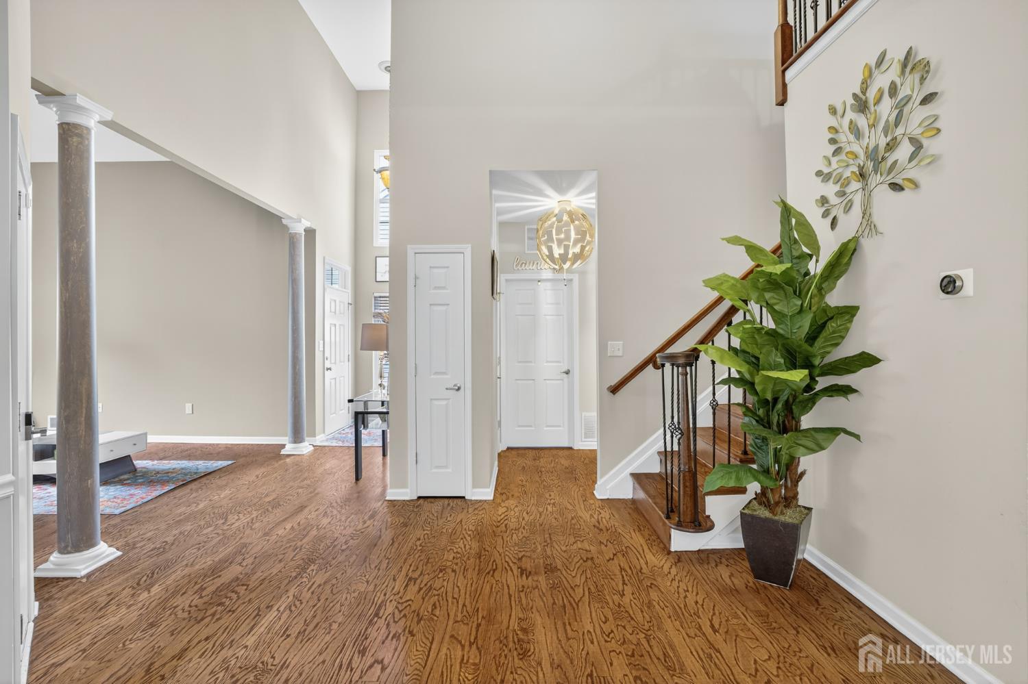 6 George Russell Way Clifton, NJ 07013 - Photo 7 of 45 a view of entryway with wooden floor