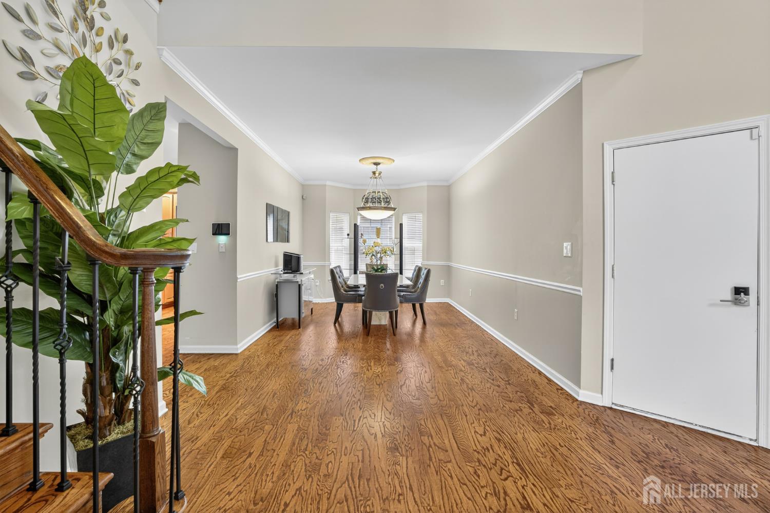 6 George Russell Way Clifton, NJ 07013 - Photo 10 of 45 a living room with furniture and a wooden floor