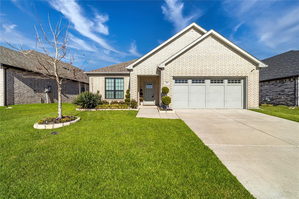 201 Brookview Drive Lavon, TX 75166 - Photo 1 of 1 a front view of a house with a yard and garage