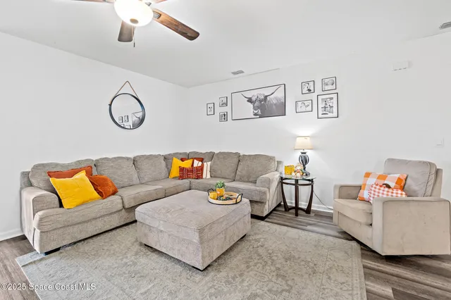 a living room with furniture and a couch