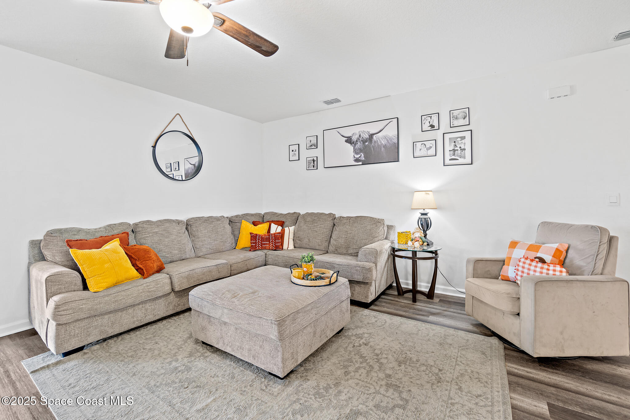3259 Burrowing Owl Mims, FL 32754 - Photo 8 of 40 a living room with furniture and a couch