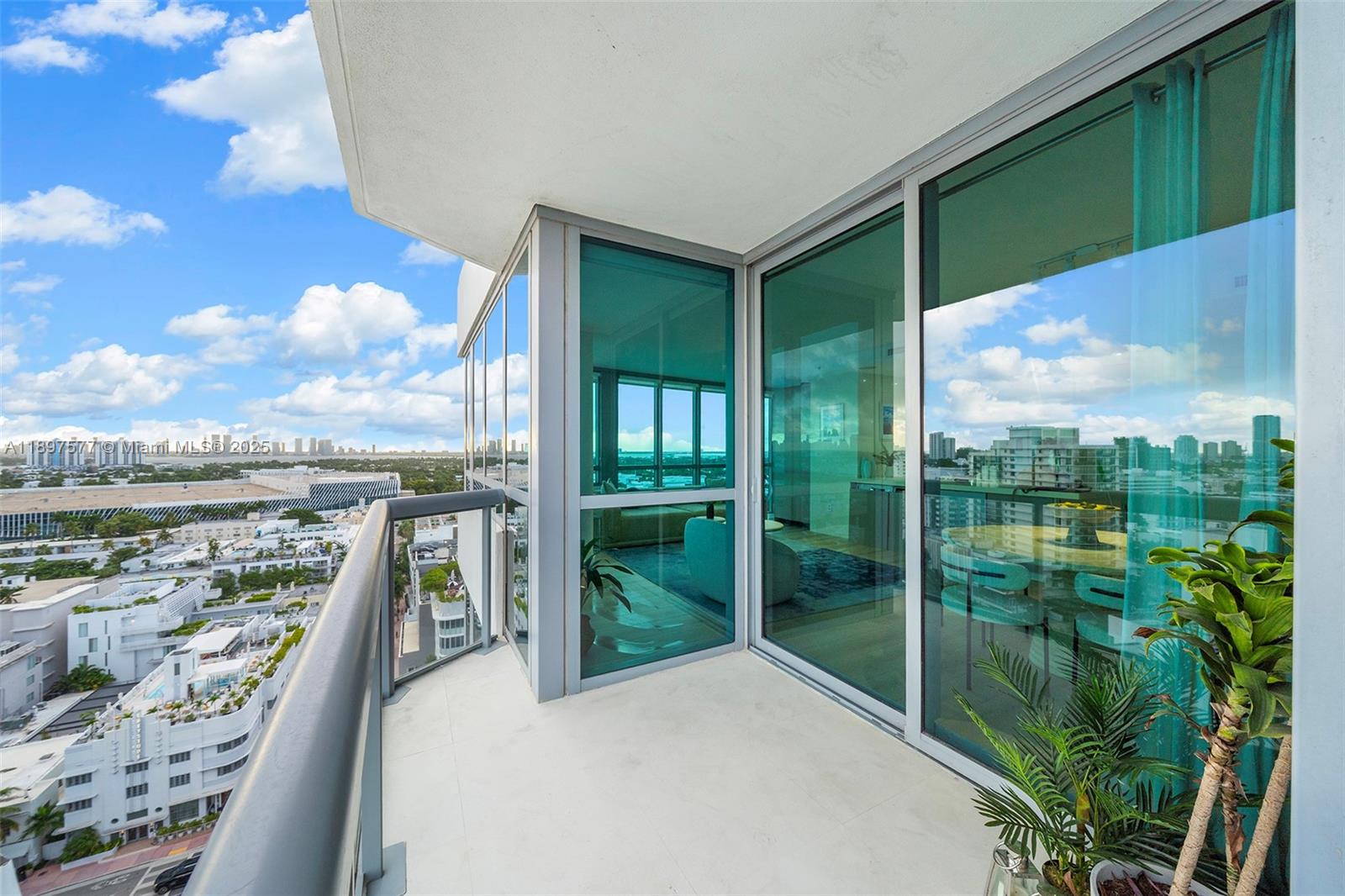 101 20th Street, Unit 2002 Miami Beach, FL 33139 - Photo 12 of 40 a balcony with a garden view
