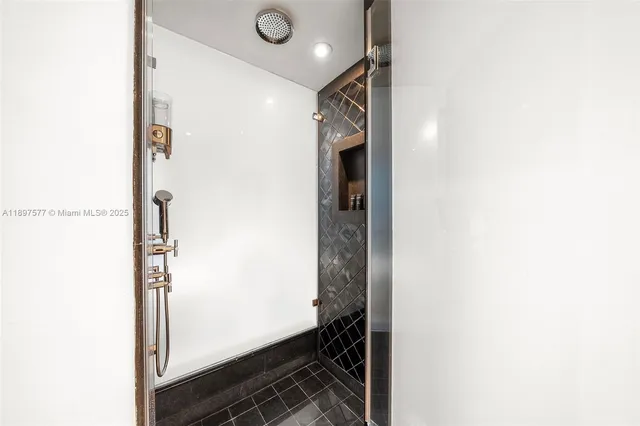 a view of hallway with wooden floor