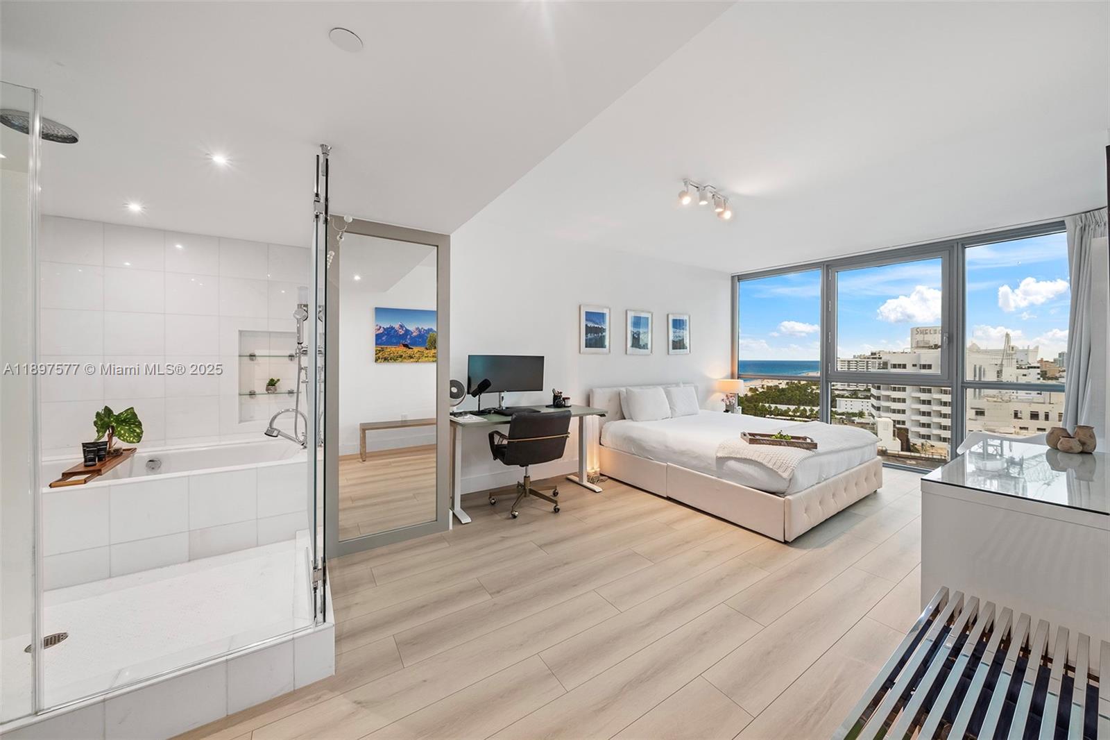 101 20th Street, Unit 2002 Miami Beach, FL 33139 - Photo 27 of 40 a living room with furniture and a large window