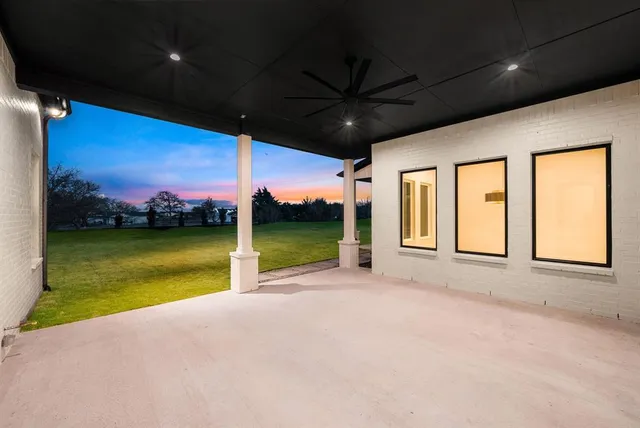 a view of swimming pool with a yard