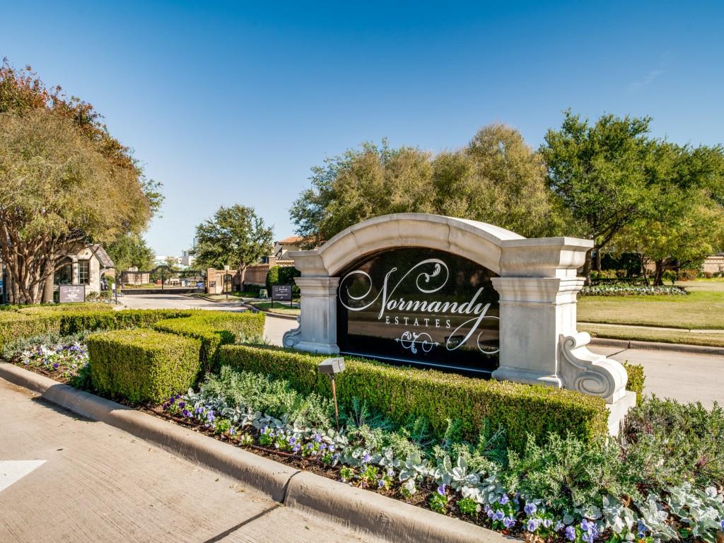 a view of a park that has a sign board on both side of it