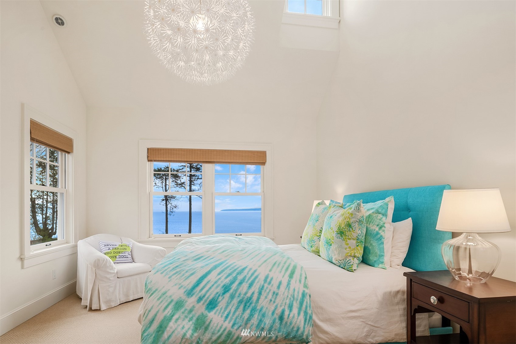 8143 Headlands Way Clinton, WA 98236 - Photo 16 of 26 a bedroom with a bed and window