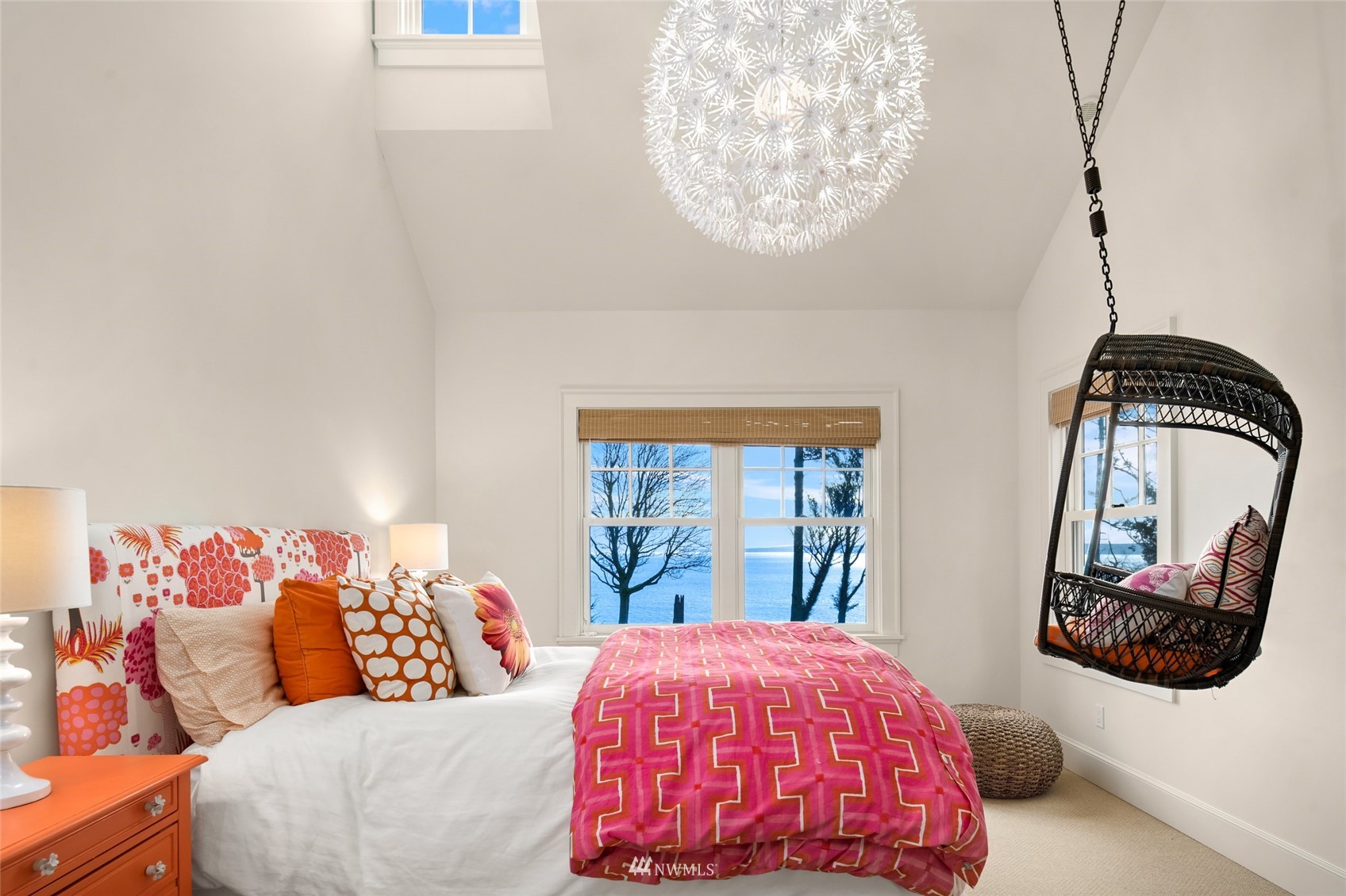 8143 Headlands Way Clinton, WA 98236 - Photo 18 of 26 a bedroom with a large bed and a window