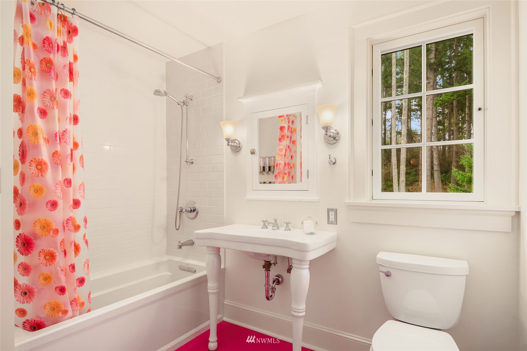 8143 Headlands Way Clinton, WA 98236 - Photo 19 of 26 a bathroom with a sink toilet and shower