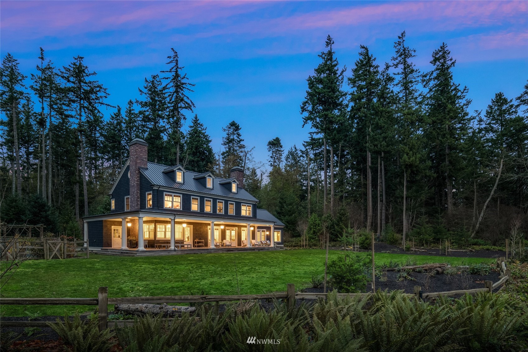 8143 Headlands Way Clinton, WA 98236 - Photo 25 of 26 a view of a house with outdoor space and garden