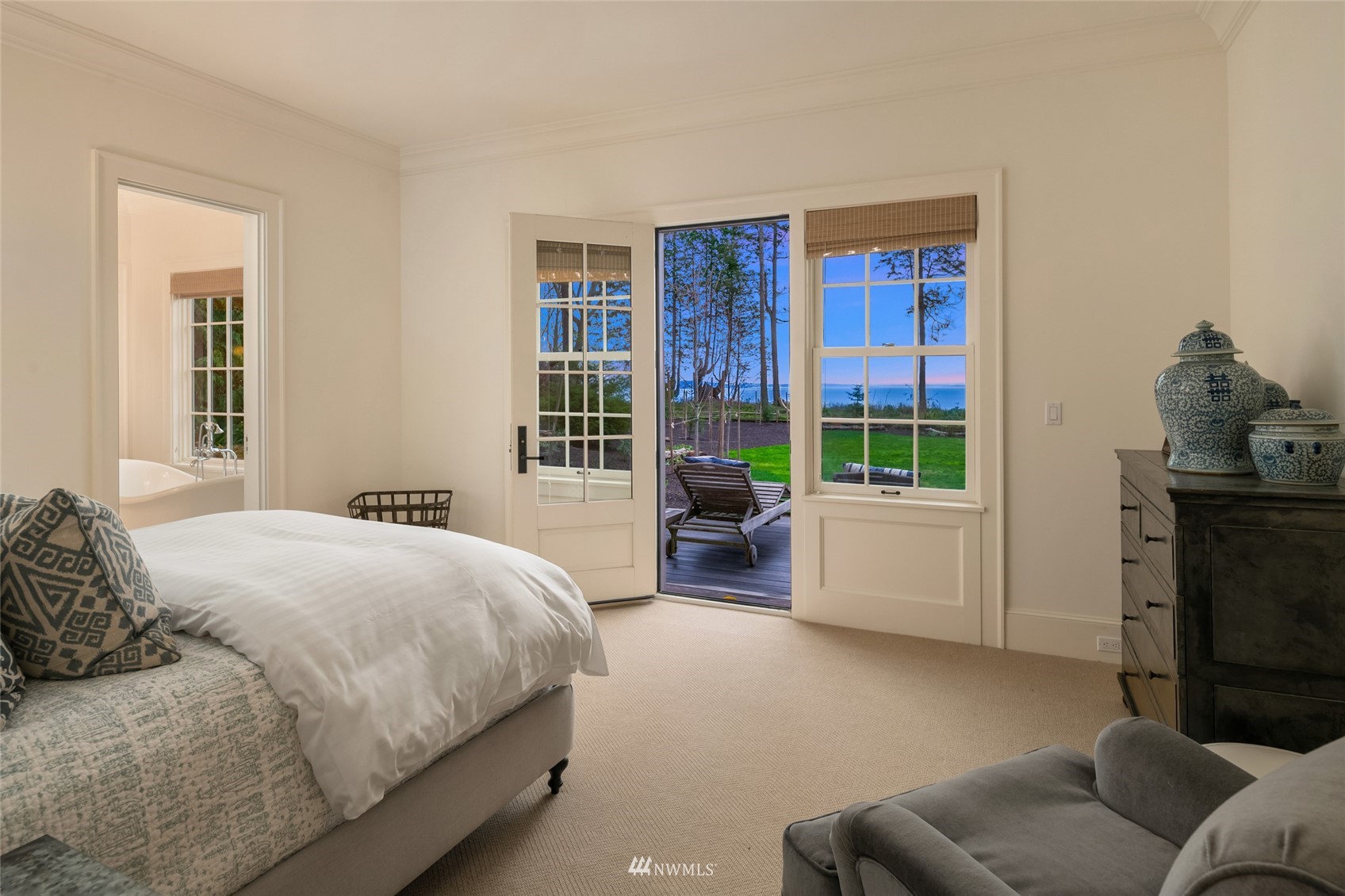 8143 Headlands Way Clinton, WA 98236 - Photo 10 of 26 a bedroom with a bed and a couch