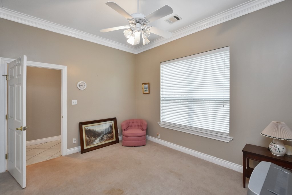 208 East 20th Street Cameron, TX 76520 - Photo 14 of 20 a spacious bedroom with a bed and a window