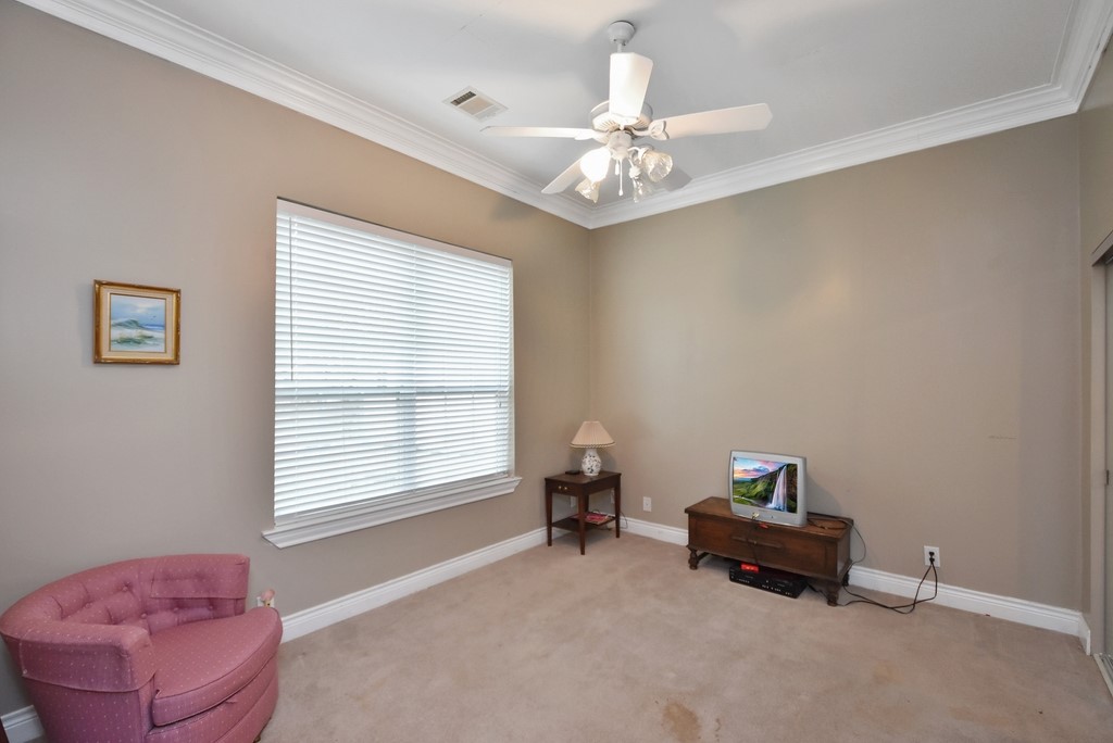 208 East 20th Street Cameron, TX 76520 - Photo 15 of 20 a living room with furniture and a window