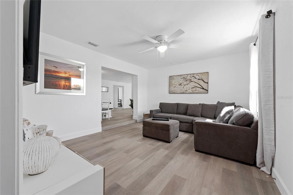 52 North York Road Avon Park, FL 33825 - Photo 17 of 44 a living room with furniture and a wooden floor
