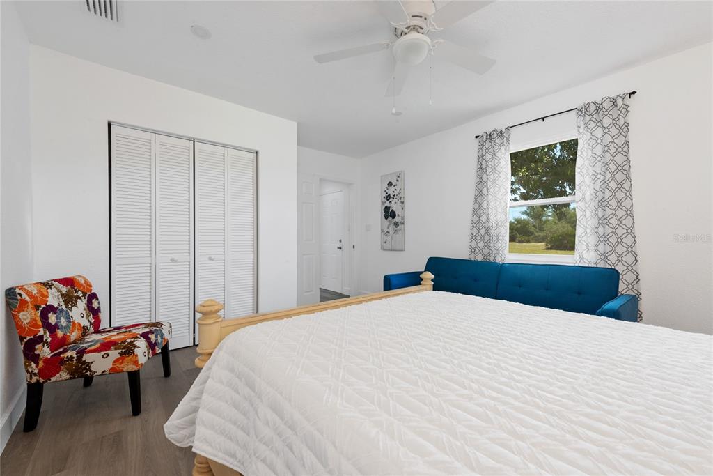 52 North York Road Avon Park, FL 33825 - Photo 21 of 44 a bedroom with a bed and a window