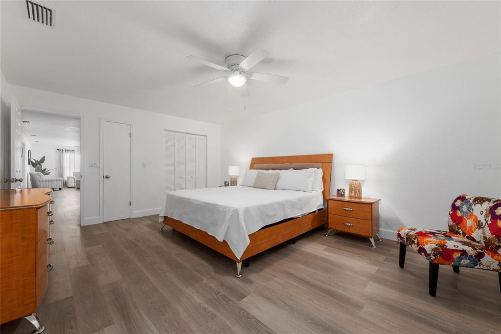 52 North York Road Avon Park, FL 33825 - Photo 23 of 44 a bedroom with a bed and a table in it