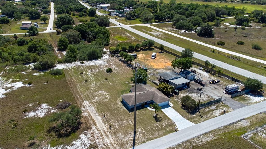 52 North York Road Avon Park, FL 33825 - Photo 34 of 44 a view of a garden with a patio