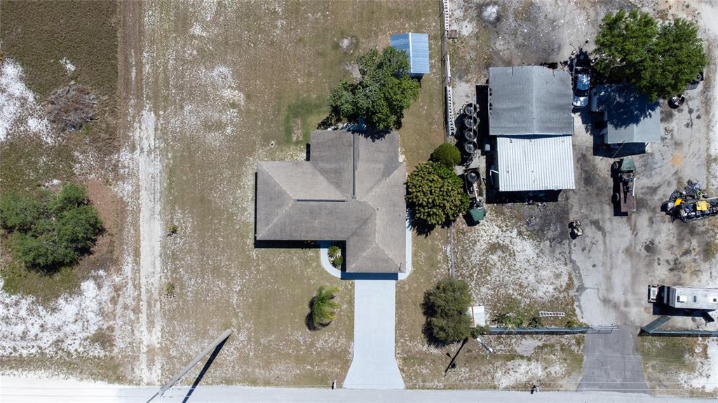 52 North York Road Avon Park, FL 33825 - Photo 41 of 44 an aerial view of houses with outdoor space