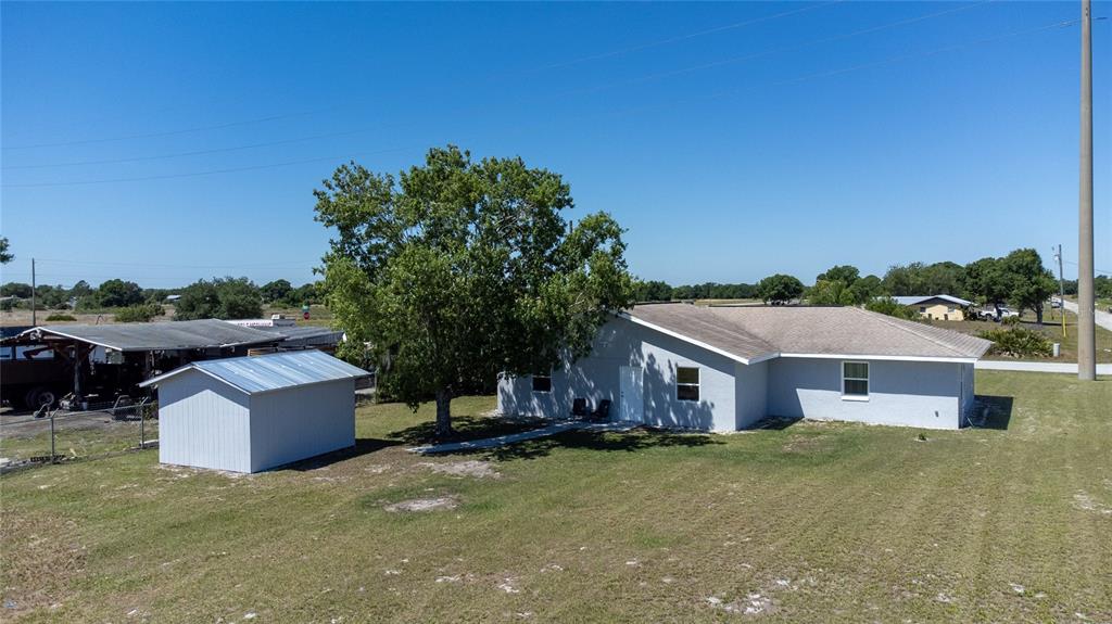 52 North York Road Avon Park, FL 33825 - Photo 43 of 44 a front view of a house with a yard