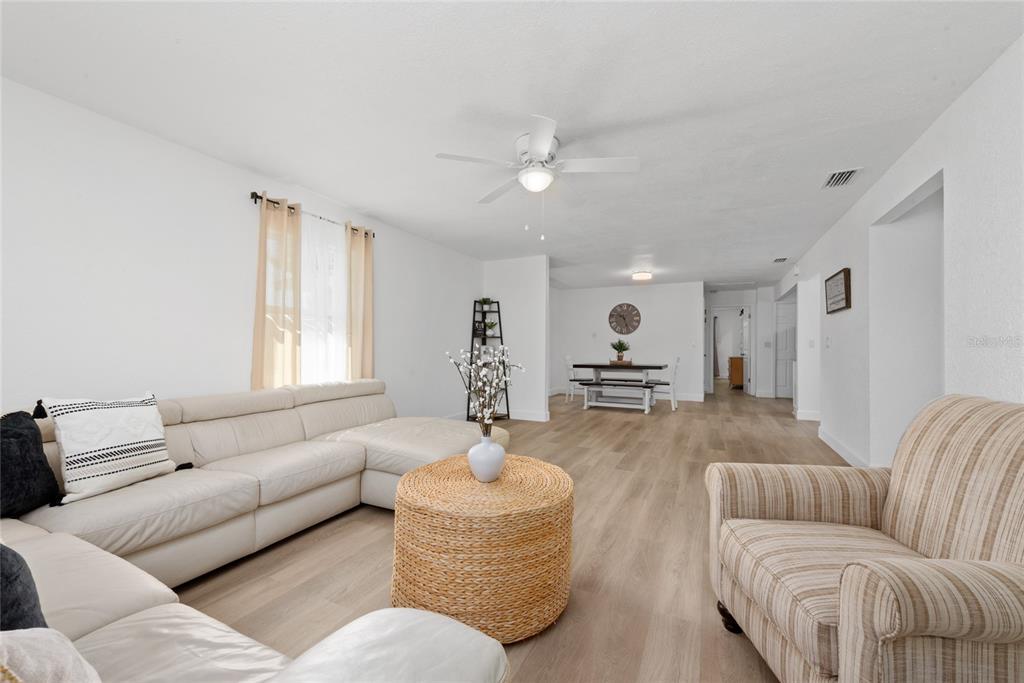 52 North York Road Avon Park, FL 33825 - Photo 8 of 44 a living room with furniture and a large window