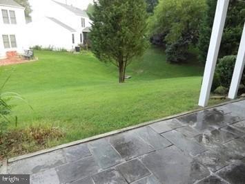 106 Lindenridge Road Laurel, MD 20724 - Photo 3 of 17 a view of backyard with green space