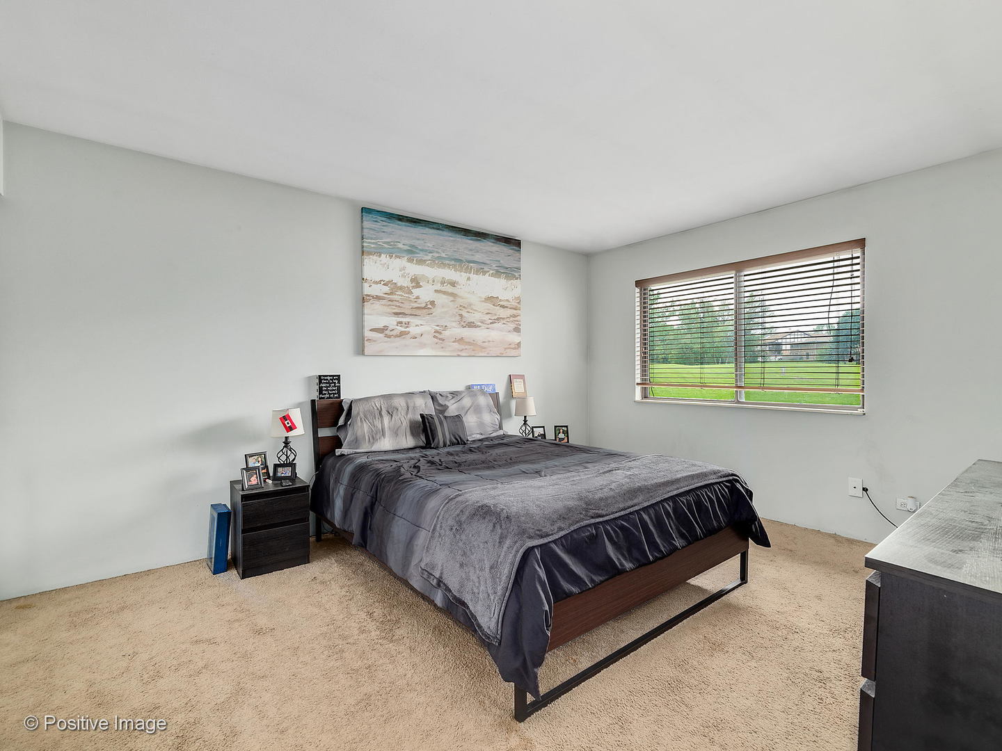773 High Ridge Road Roselle, IL 60172 - Photo 11 of 18 a bedroom with a bed and window