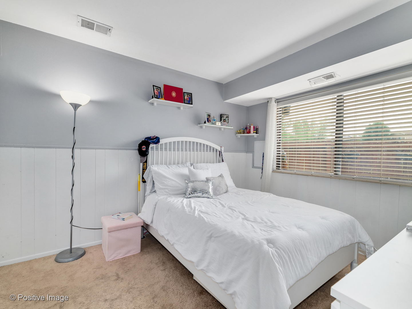 773 High Ridge Road Roselle, IL 60172 - Photo 15 of 18 a bedroom with a bed and a window