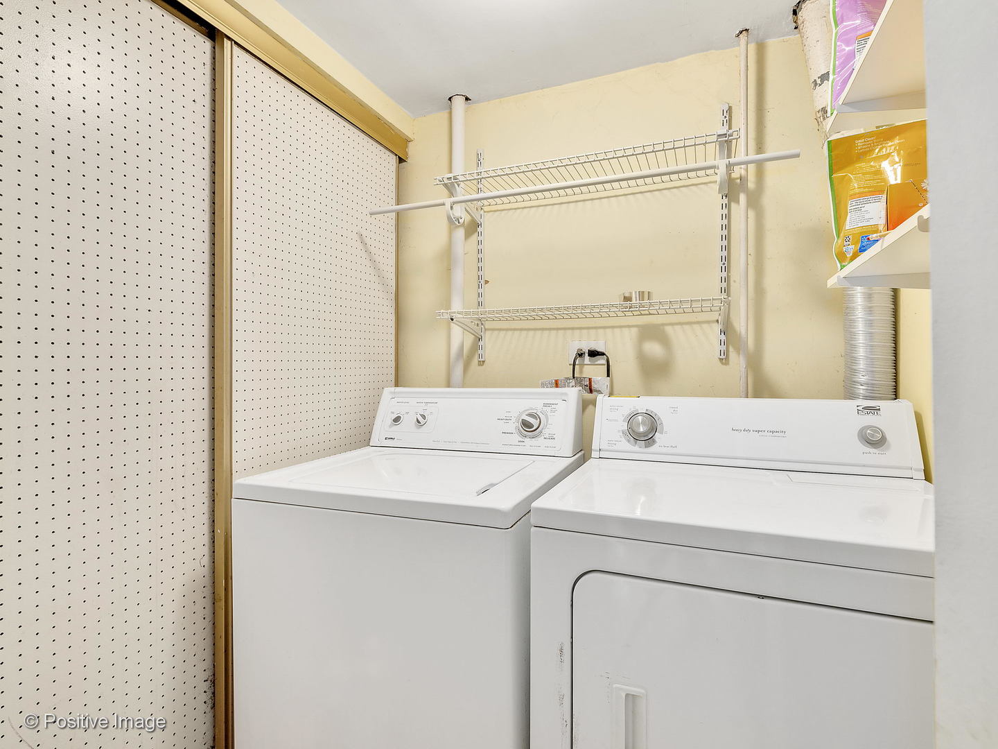 773 High Ridge Road Roselle, IL 60172 - Photo 17 of 18 a utility room with dryer and washer
