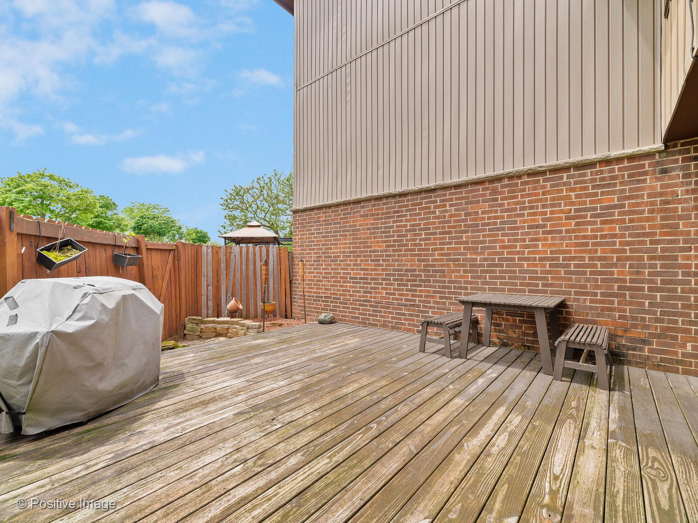 773 High Ridge Road Roselle, IL 60172 - Photo 18 of 18 a backyard of a house with table and chairs