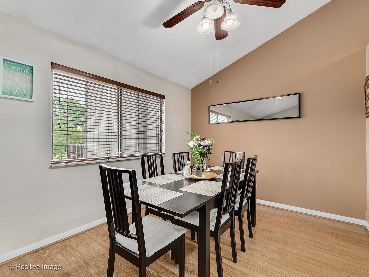 773 High Ridge Road Roselle, IL 60172 - Photo 5 of 18 a view of a dining room with furniture and wooden floor