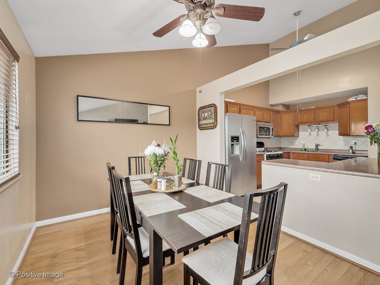 773 High Ridge Road Roselle, IL 60172 - Photo 6 of 18 a view of a dining room with furniture and wooden floor