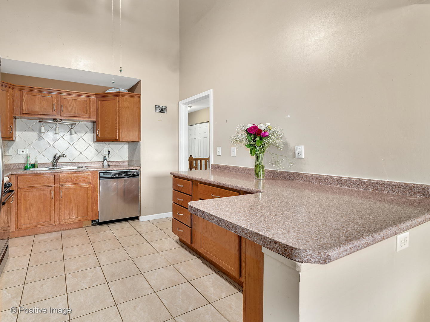 773 High Ridge Road Roselle, IL 60172 - Photo 8 of 18 a kitchen with a sink a counter top space and cabinets