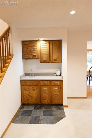 a bathroom with a sink a mirror and a bathtub
