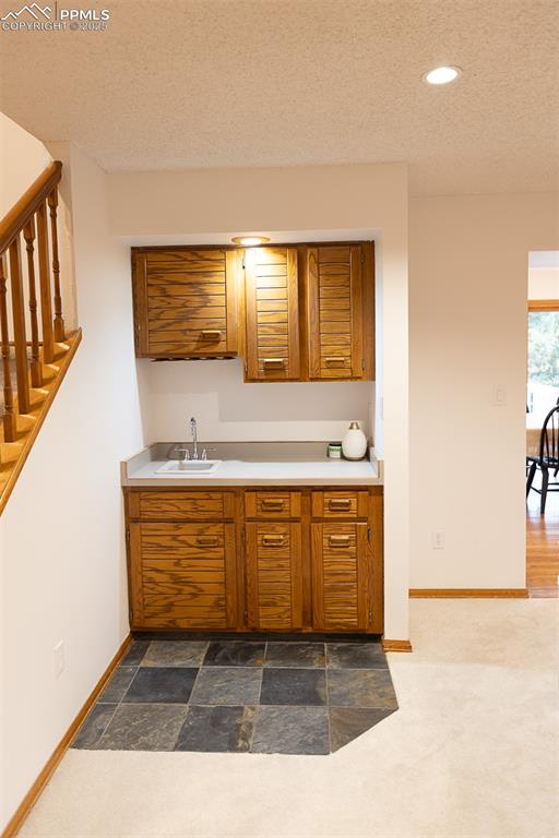 555 Hidden Marsh Road Monument, CO 80132 - Photo 12 of 47 a bathroom with a sink a mirror and a bathtub