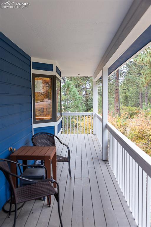 555 Hidden Marsh Road Monument, CO 80132 - Photo 3 of 47 a view of a two chairs in the balcony