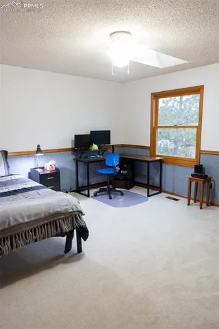 a spacious bathroom with a double vanity sink mirror and double