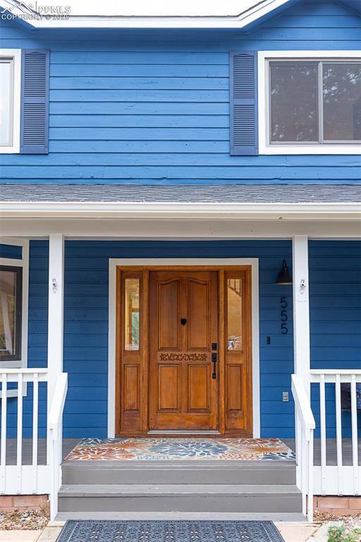 555 Hidden Marsh Road Monument, CO 80132 - Photo 4 of 47 a view of entrance door of the house