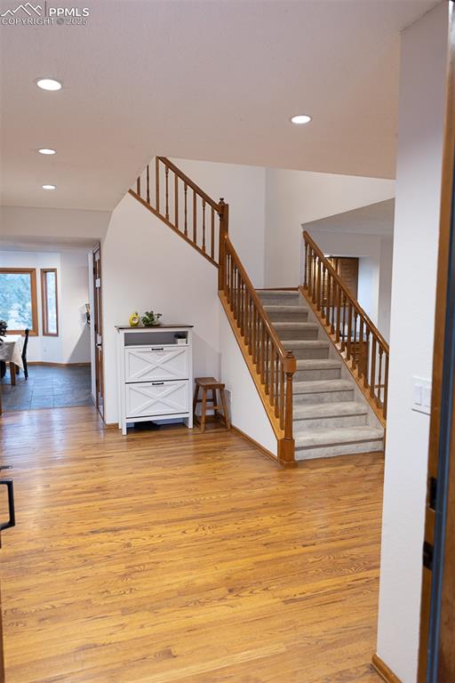555 Hidden Marsh Road Monument, CO 80132 - Photo 5 of 47 a view of entryway and hall with wooden floor