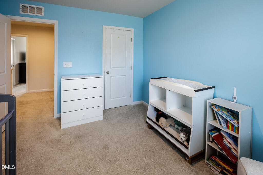 4468 Captain Falls Drive Raleigh, NC 27610 - Photo 17 of 36 a room with storage and utility