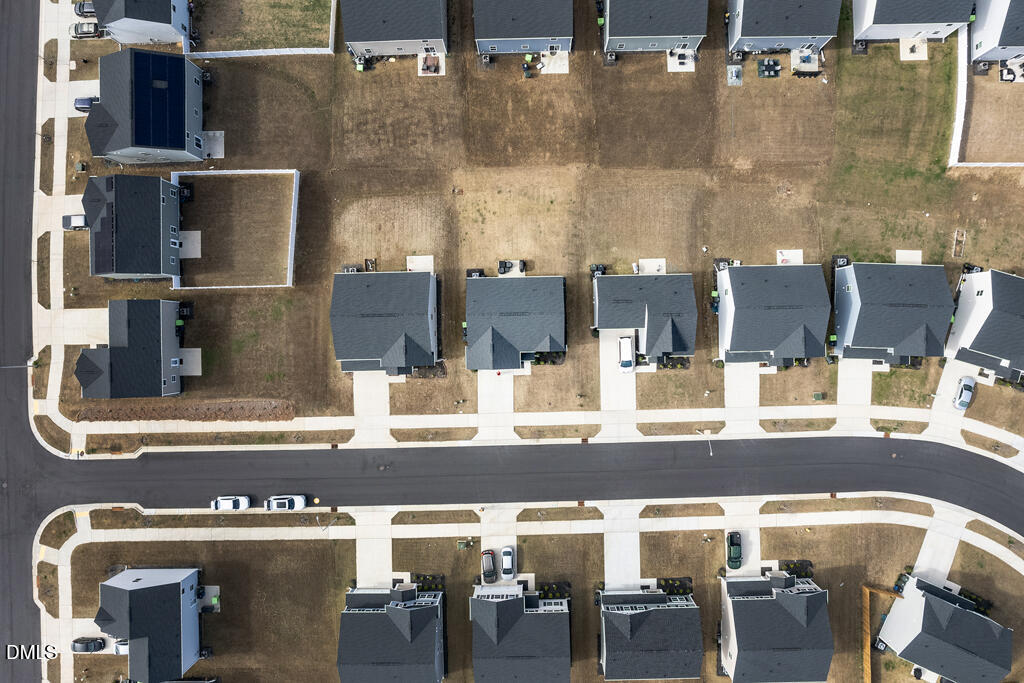 4468 Captain Falls Drive Raleigh, NC 27610 - Photo 31 of 36 a view of a dining room with furniture
