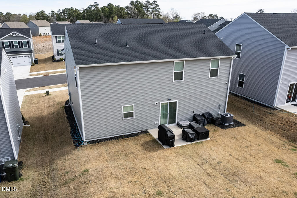 4468 Captain Falls Drive Raleigh, NC 27610 - Photo 34 of 36 a backyard of a house