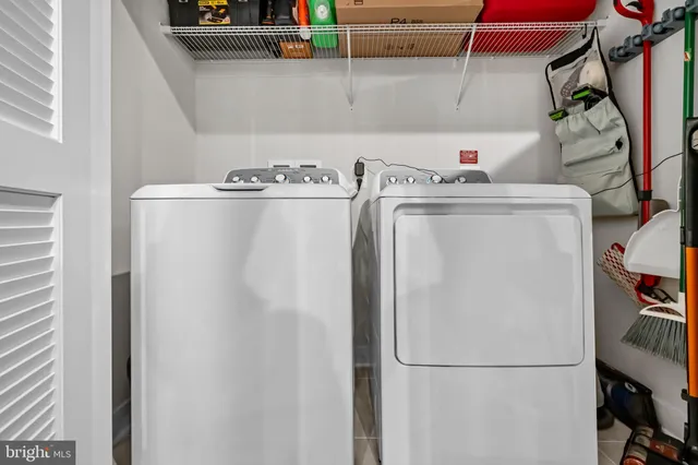 a bedroom with a bed and furniture