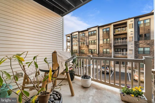 a front view of a building with glass windows