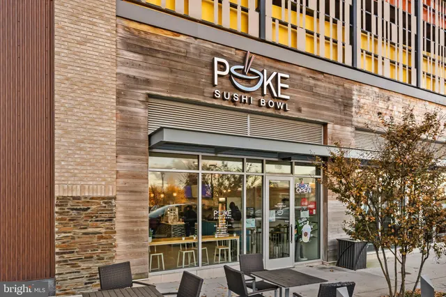 a sign on a pole on a street