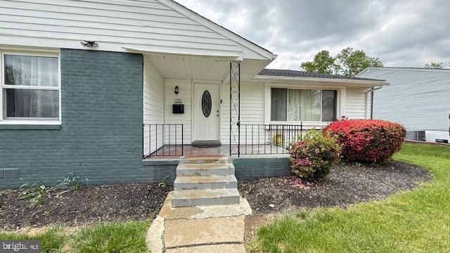 7907 Subet Road Windsor Mill, MD 21244 - Photo 2 of 31 a front view of a house with a garden